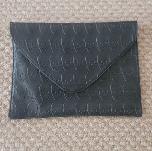 Skull printed envelope style clutch